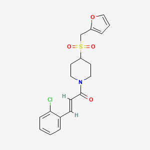 (E)-3-(2-chlorophenyl)-1-(4-((furan-2-ylmethyl)sulfonyl)piperidin-1-yl)prop-2-en-1-one
