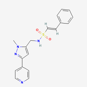 (E)-N-{[1-methyl-3-(pyridin-4-yl)-1H-pyrazol-5-yl]methyl}-2-phenylethene-1-sulfonamide