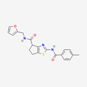 N-(furan-2-ylmethyl)-2-(4-methylbenzamido)-5,6-dihydro-4H-cyclopenta[d]thiazole-4-carboxamide