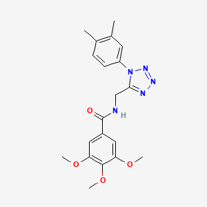 molecular formula C20H23N5O4 B2683297 N-{[1-(3,4-dimethylphenyl)-1H-1,2,3,4-tetrazol-5-yl]methyl}-3,4,5-trimethoxybenzamide CAS No. 933009-85-9