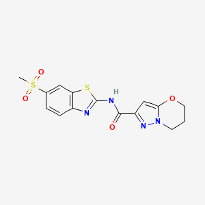 molecular formula C15H14N4O4S2 B2683400 N-(6-(methylsulfonyl)benzo[d]thiazol-2-yl)-6,7-dihydro-5H-pyrazolo[5,1-b][1,3]oxazine-2-carboxamide CAS No. 1448073-00-4