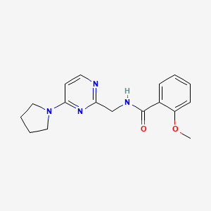 B2683484 2-methoxy-N-((4-(pyrrolidin-1-yl)pyrimidin-2-yl)methyl)benzamide CAS No. 1797328-39-2