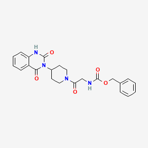 molecular formula C23H24N4O5 B2684316 benzyl (2-(4-(2,4-dioxo-1,2-dihydroquinazolin-3(4H)-yl)piperidin-1-yl)-2-oxoethyl)carbamate CAS No. 2034600-35-4
