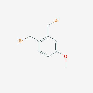 molecular formula C9H10Br2O B2687874 1,2-Bis(bromomethyl)-4-methoxybenzene CAS No. 36132-96-4