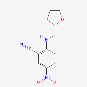 5-Nitro-2-[(tetrahydrofuran-2-ylmethyl)amino]benzonitrile