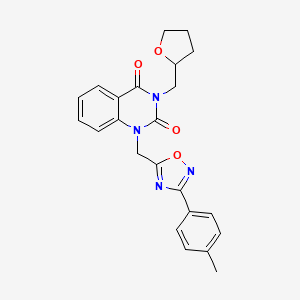 molecular formula C23H22N4O4 B2689671 1-{[3-(4-methylphenyl)-1,2,4-oxadiazol-5-yl]methyl}-3-[(oxolan-2-yl)methyl]-1,2,3,4-tetrahydroquinazoline-2,4-dione CAS No. 1105221-44-0