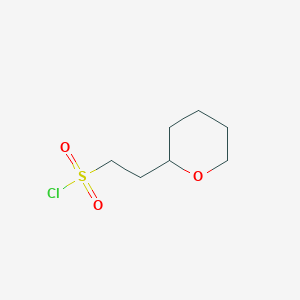 molecular formula C7H13ClO3S B2689822 2-(Oxan-2-yl)ethane-1-sulfonyl chloride CAS No. 1267215-74-6