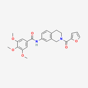 molecular formula C24H24N2O6 B2690232 N-(2-(furan-2-carbonyl)-1,2,3,4-tetrahydroisoquinolin-7-yl)-3,4,5-trimethoxybenzamide CAS No. 955684-13-6