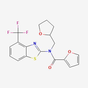 molecular formula C18H15F3N2O3S B2693534 N-[(oxolan-2-yl)methyl]-N-[4-(trifluoromethyl)-1,3-benzothiazol-2-yl]furan-2-carboxamide CAS No. 1396765-44-8