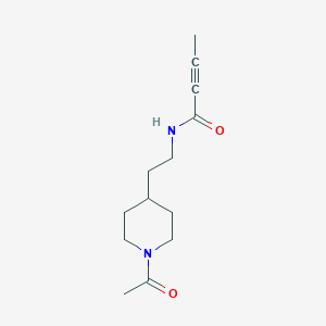 molecular formula C13H20N2O2 B2694540 N-[2-(1-Acetylpiperidin-4-yl)ethyl]but-2-ynamide CAS No. 2411220-86-3