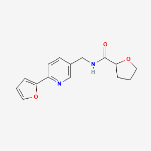 molecular formula C15H16N2O3 B2695327 N-{[6-(furan-2-yl)pyridin-3-yl]methyl}oxolane-2-carboxamide CAS No. 2034394-64-2