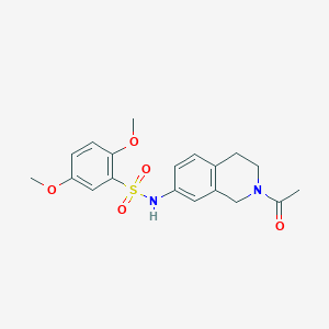 molecular formula C19H22N2O5S B2696157 N-(2-acetyl-1,2,3,4-tetrahydroisoquinolin-7-yl)-2,5-dimethoxybenzene-1-sulfonamide CAS No. 955746-93-7
