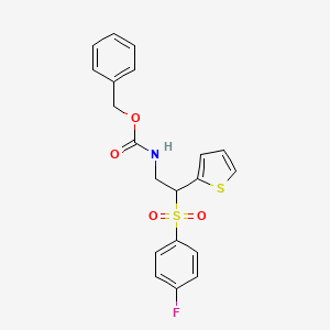 molecular formula C20H18FNO4S2 B2696312 Benzyl (2-((4-fluorophenyl)sulfonyl)-2-(thiophen-2-yl)ethyl)carbamate CAS No. 896329-78-5