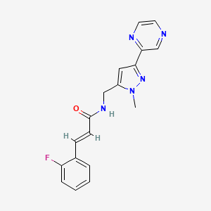 molecular formula C18H16FN5O B2697420 (E)-3-(2-fluorophenyl)-N-((1-methyl-3-(pyrazin-2-yl)-1H-pyrazol-5-yl)methyl)acrylamide CAS No. 2035006-77-8