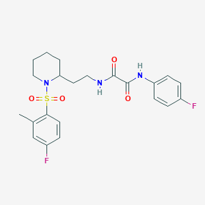 molecular formula C22H25F2N3O4S B2697421 N-{2-[1-(4-fluoro-2-methylbenzenesulfonyl)piperidin-2-yl]ethyl}-N'-(4-fluorophenyl)ethanediamide CAS No. 898407-23-3