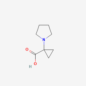molecular formula C8H13NO2 B2697475 1-(Pyrrolidin-1-yl)cyclopropane-1-carboxylic acid CAS No. 1451040-52-0