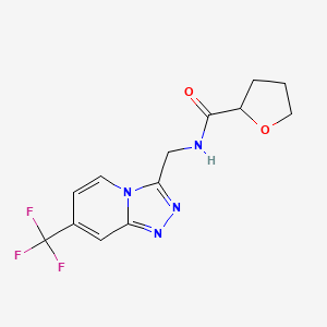 molecular formula C13H13F3N4O2 B2698050 N-{[7-(trifluoromethyl)-[1,2,4]triazolo[4,3-a]pyridin-3-yl]methyl}oxolane-2-carboxamide CAS No. 2034374-05-3