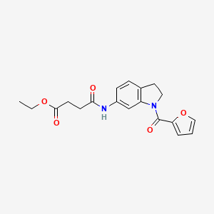 molecular formula C19H20N2O5 B2699794 Ethyl 4-((1-(furan-2-carbonyl)indolin-6-yl)amino)-4-oxobutanoate CAS No. 1207055-38-6
