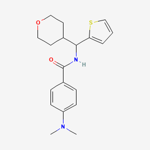 4-(dimethylamino)-N-[(oxan-4-yl)(thiophen-2-yl)methyl]benzamide