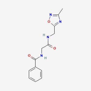 molecular formula C13H14N4O3 B2701495 N-(2-(((3-methyl-1,2,4-oxadiazol-5-yl)methyl)amino)-2-oxoethyl)benzamide CAS No. 1207009-79-7