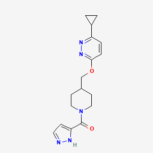 molecular formula C17H21N5O2 B2701856 [4-[(6-Cyclopropylpyridazin-3-yl)oxymethyl]piperidin-1-yl]-(1H-pyrazol-5-yl)methanone CAS No. 2380069-87-2