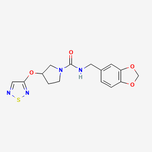 B2701948 N-(1,3-Benzodioxol-5-ylmethyl)-3-(1,2,5-thiadiazol-3-yloxy)pyrrolidine-1-carboxamide CAS No. 2320535-80-4