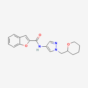 molecular formula C18H19N3O3 B2703177 N-{1-[(oxan-2-yl)methyl]-1H-pyrazol-4-yl}-1-benzofuran-2-carboxamide CAS No. 2034228-39-0