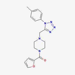 molecular formula C18H20N6O2 B2703664 furan-2-yl(4-((1-(p-tolyl)-1H-tetrazol-5-yl)methyl)piperazin-1-yl)methanone CAS No. 1049349-70-3