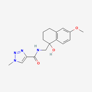 molecular formula C16H20N4O3 B2704498 N-((1-hydroxy-6-methoxy-1,2,3,4-tetrahydronaphthalen-1-yl)methyl)-1-methyl-1H-1,2,3-triazole-4-carboxamide CAS No. 2034531-43-4