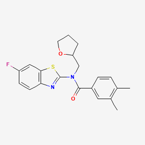 molecular formula C21H21FN2O2S B2704929 N-(6-fluoro-1,3-benzothiazol-2-yl)-3,4-dimethyl-N-[(oxolan-2-yl)methyl]benzamide CAS No. 920163-94-6