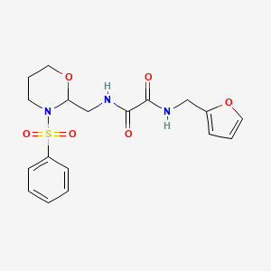molecular formula C18H21N3O6S B2706737 N'-{[3-(benzenesulfonyl)-1,3-oxazinan-2-yl]methyl}-N-[(furan-2-yl)methyl]ethanediamide CAS No. 872881-28-2