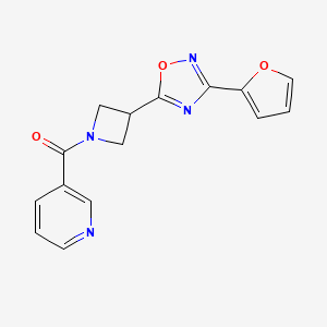 molecular formula C15H12N4O3 B2707406 (3-(3-(Furan-2-yl)-1,2,4-oxadiazol-5-yl)azetidin-1-yl)(pyridin-3-yl)methanone CAS No. 1428350-75-7