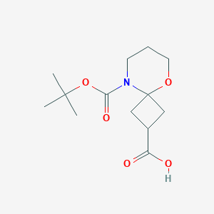 molecular formula C13H21NO5 B2708193 9-[(2-Methylpropan-2-yl)oxycarbonyl]-5-oxa-9-azaspiro[3.5]nonane-2-carboxylic acid CAS No. 2248370-19-4