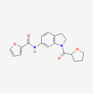 molecular formula C18H18N2O4 B2710277 N-(1-(tetrahydrofuran-2-carbonyl)indolin-6-yl)furan-2-carboxamide CAS No. 1040657-62-2