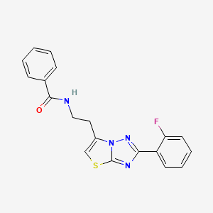 molecular formula C19H15FN4OS B2710315 N-{2-[2-(2-fluorophenyl)-[1,2,4]triazolo[3,2-b][1,3]thiazol-6-yl]ethyl}benzamide CAS No. 895790-01-9
