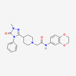 molecular formula C24H27N5O4 B2710579 N-(2,3-dihydro-1,4-benzodioxin-6-yl)-2-[4-(1-methyl-5-oxo-4-phenyl-4,5-dihydro-1H-1,2,4-triazol-3-yl)piperidin-1-yl]acetamide CAS No. 1396759-39-9