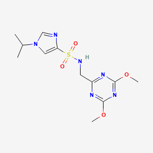 molecular formula C12H18N6O4S B2711500 N-((4,6-dimethoxy-1,3,5-triazin-2-yl)methyl)-1-isopropyl-1H-imidazole-4-sulfonamide CAS No. 2034358-46-6