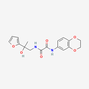 molecular formula C17H18N2O6 B2712478 N'-(2,3-dihydro-1,4-benzodioxin-6-yl)-N-[2-(furan-2-yl)-2-hydroxypropyl]ethanediamide CAS No. 1396866-40-2