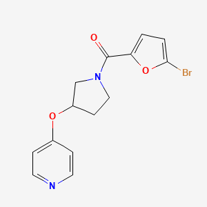 (5-Bromofuran-2-yl)(3-(pyridin-4-yloxy)pyrrolidin-1-yl)methanone