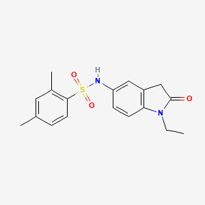 molecular formula C18H20N2O3S B2714214 N-(1-ethyl-2-oxo-2,3-dihydro-1H-indol-5-yl)-2,4-dimethylbenzene-1-sulfonamide CAS No. 921556-84-5