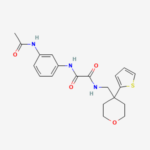 molecular formula C20H23N3O4S B2714470 N'-(3-acetamidophenyl)-N-{[4-(thiophen-2-yl)oxan-4-yl]methyl}ethanediamide CAS No. 1091418-48-2