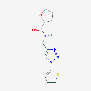 molecular formula C12H14N4O2S B2715544 N-{[1-(thiophen-2-yl)-1H-1,2,3-triazol-4-yl]methyl}oxolane-2-carboxamide CAS No. 2034381-70-7
