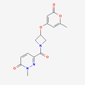 molecular formula C15H15N3O5 B2715864 2-methyl-6-(3-((6-methyl-2-oxo-2H-pyran-4-yl)oxy)azetidine-1-carbonyl)pyridazin-3(2H)-one CAS No. 1795300-18-3
