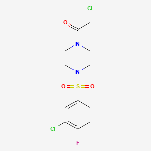 molecular formula C12H13Cl2FN2O3S B2717931 2-Chloro-1-[4-(3-chloro-4-fluorobenzenesulfonyl)piperazin-1-yl]ethan-1-one CAS No. 923780-46-5
