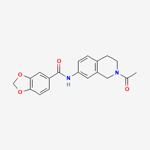 molecular formula C19H18N2O4 B2718843 N-(2-acetyl-1,2,3,4-tetrahydroisoquinolin-7-yl)-2H-1,3-benzodioxole-5-carboxamide CAS No. 955758-30-2