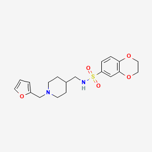 molecular formula C19H24N2O5S B2723266 N-({1-[(furan-2-yl)methyl]piperidin-4-yl}methyl)-2,3-dihydro-1,4-benzodioxine-6-sulfonamide CAS No. 952965-74-1