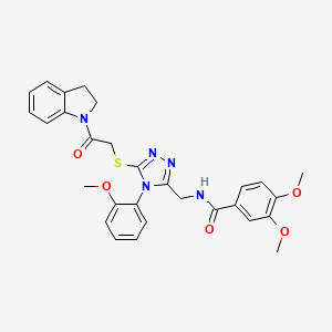 N-((5-((2-(indolin-1-yl)-2-oxoethyl)thio)-4-(2-methoxyphenyl)-4H-1,2,4-triazol-3-yl)methyl)-3,4-dimethoxybenzamide
