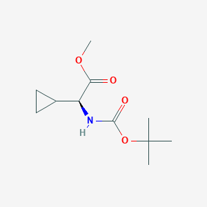 molecular formula C11H19NO4 B2723749 methyl (2S)-2-{[(tert-butoxy)carbonyl]amino}-2-cyclopropylacetate CAS No. 1449295-52-6