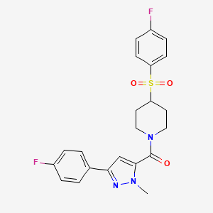 molecular formula C22H21F2N3O3S B2723808 (3-(4-fluorophenyl)-1-methyl-1H-pyrazol-5-yl)(4-((4-fluorophenyl)sulfonyl)piperidin-1-yl)methanone CAS No. 1448053-22-2