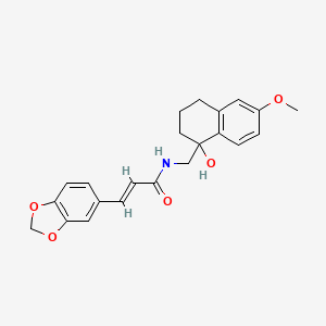 (E)-3-(benzo[d][1,3]dioxol-5-yl)-N-((1-hydroxy-6-methoxy-1,2,3,4-tetrahydronaphthalen-1-yl)methyl)acrylamide